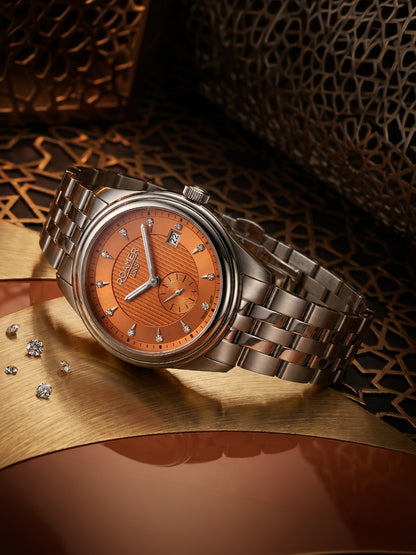 Vespera Diamond 41 mm Quartz Two-Hand Date Orange Sunray Dial Silver Tone Bracelet Sapphire Glass Stainless Steel Swiss Watch